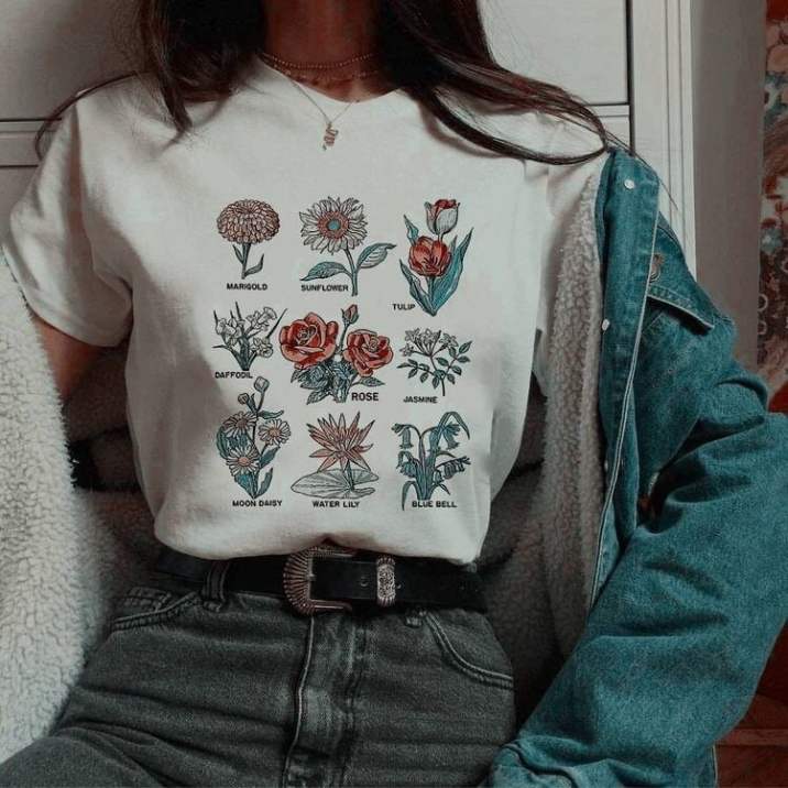 a graphic tee with flowers on it